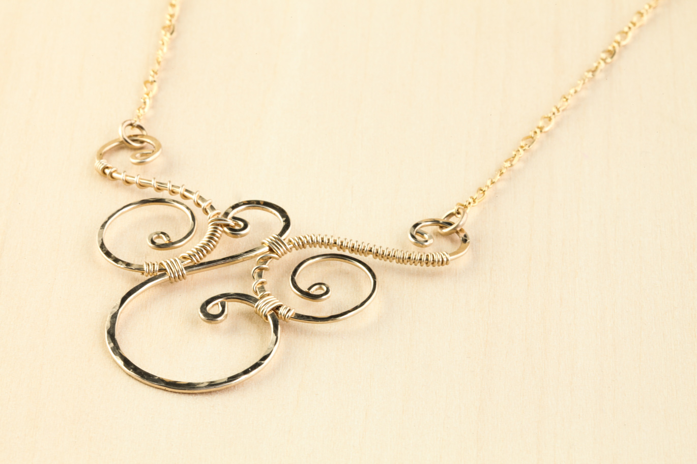 Trio - Handmade Wire Wrapped Spirals Necklace - Hammered Gold ...