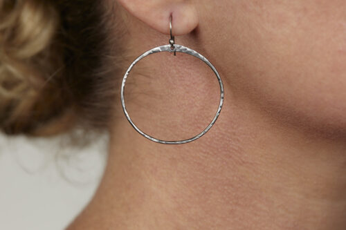 Zen Circle Boho Hoop Earrings in Iron feature hand forged iron hammered hoops that are polished to a bright shine. The sterling silver ear wires match the bright polished iron tones. These simple and minimalist boho hoop earrings are perfect for every day or for a fancy night out on the town. A perfect 6th anniversary gift for her.