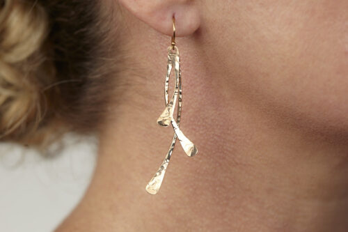 Trio Elegant Dangle Earrings in Bronze - The three delicately curved and hammered bronze dangles reflect in faceted light. The gold fill ear wires match the warm tones of the bronze perfectly. Small and light enough for every day, but sophisticated enough for a fancy night out, the Trio Dangle Earrings in Bronze are perfect for every occasion. 8th anniversary gifts for her.